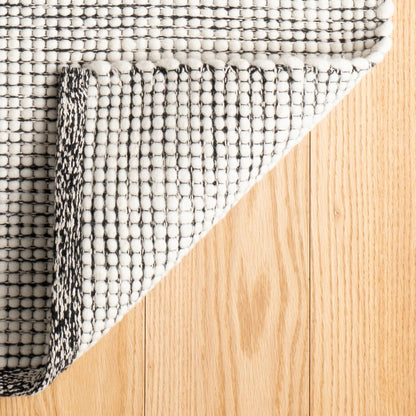 TAPIS EN DÉSTOCKAGE - Tapis en laine tissé main Network noir - 2,44 m x 3,05 m