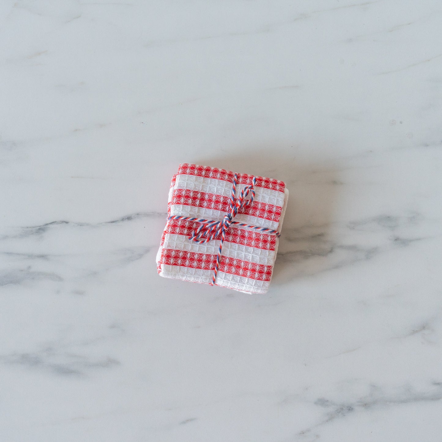 Ensemble de torchons rouges à motif gaufré