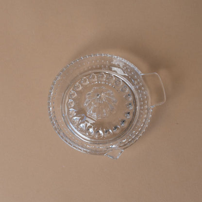 Presse-agrumes en verre pressé