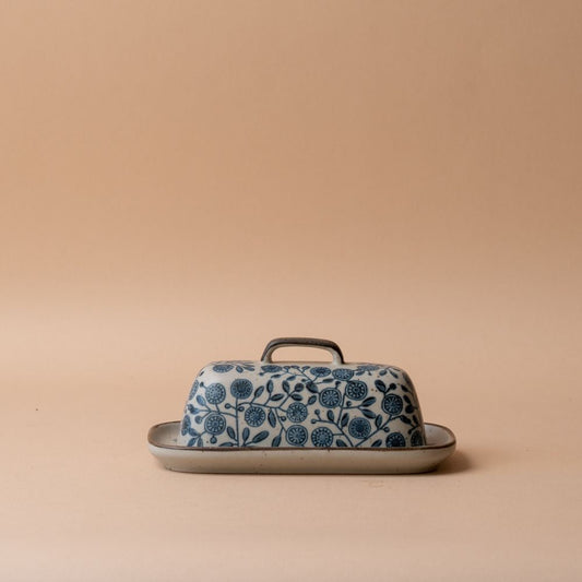 Beurrier en grès à motif de calendula