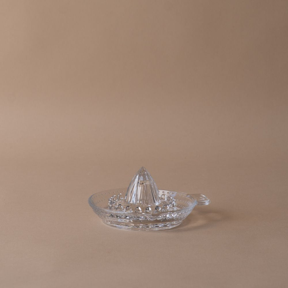 Presse-agrumes en verre pressé