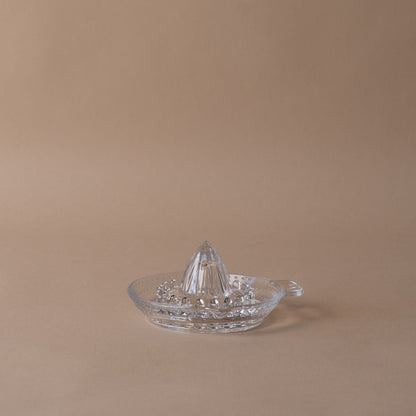 Presse-agrumes en verre pressé